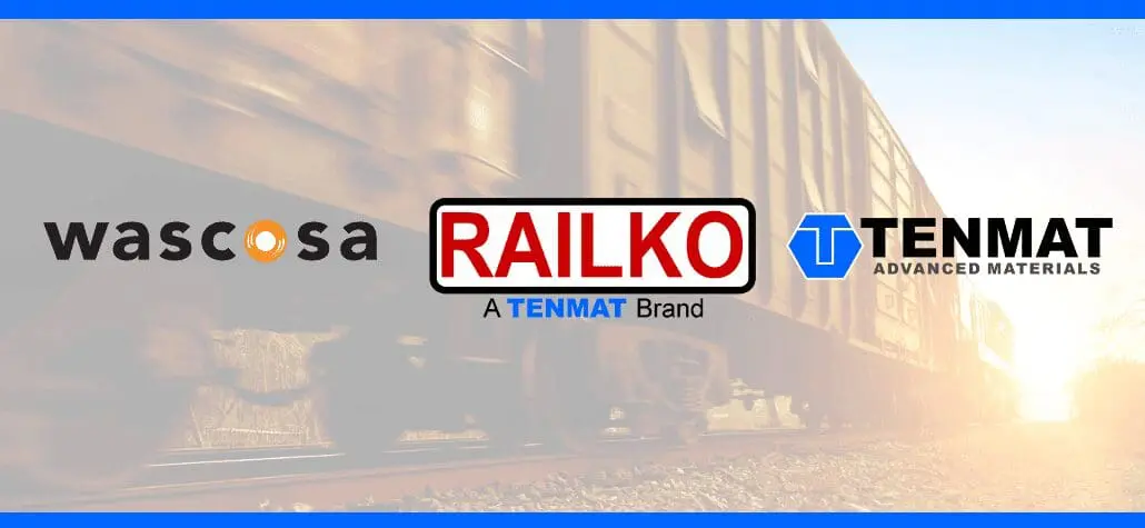 Logos of Wascosa, Railko (a Tenmat brand), and Tenmat over a blurred image of a moving train.