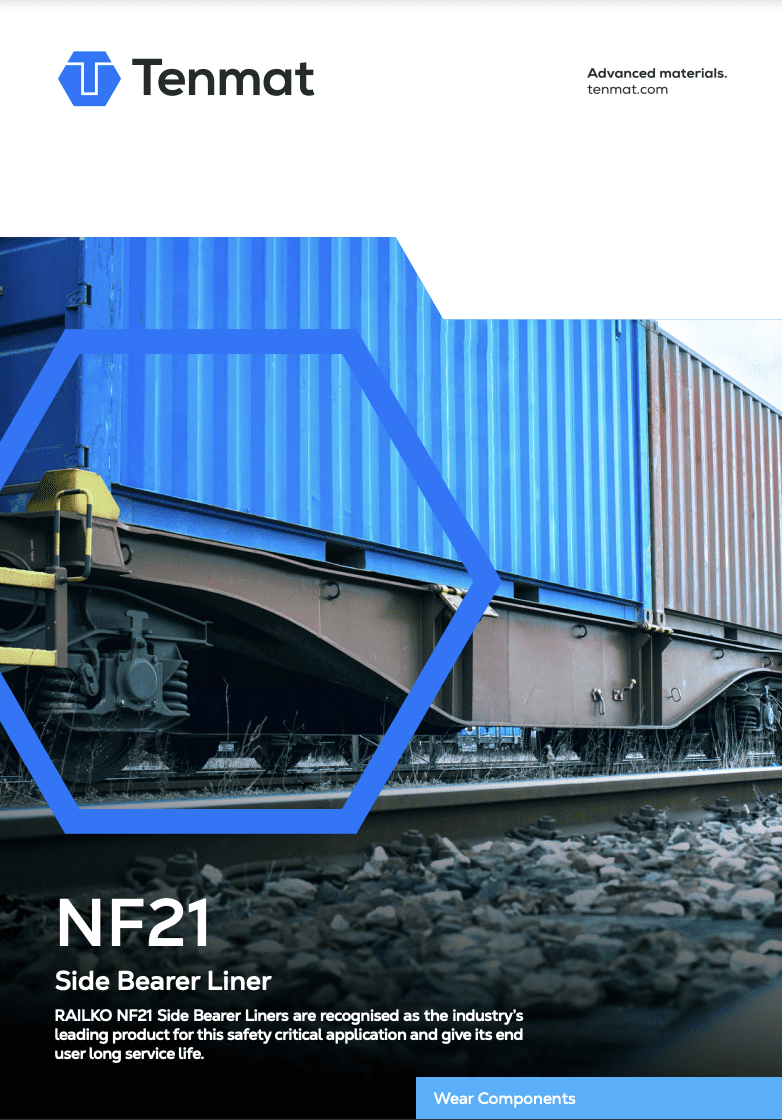 A close-up of a blue freight train container on railway tracks, with a Tenmat logo and NF21 product text.