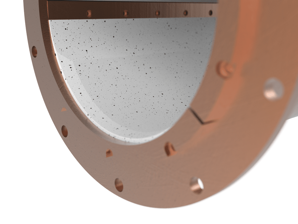 assembly-model-1-bronze-housing.23 Close-up of a round copper pipe flange with bolt holes and a white, slightly speckled interior surface.