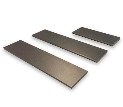 Three rectangular metal plates of varying sizes arranged side by side on a white background.