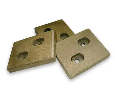 Three rectangular brown plates with two round holes in each, arranged on a white background.