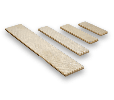Four rectangular wooden boards of different lengths arranged in parallel on a white background.
