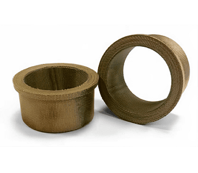 Two cylindrical metallic bushings, one standing upright and the other lying on its side, on a white background.