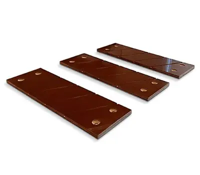 Three rectangular chocolate bars with diagonal lines and four round indents on each, on a white background.