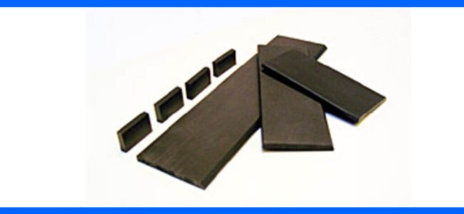 FEROFORM-F200A-Carbon-Rotor-Vanes-1 Five large and four small rectangular black carbon strips arranged on a white surface.