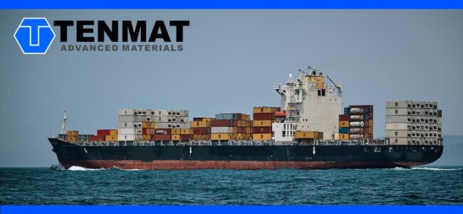 railko-marine-bearings A large cargo ship carrying containers at sea, with the Tenmat Advanced Materials logo and name at the top left.