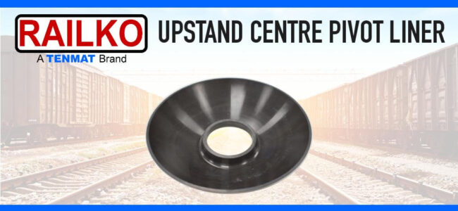 railko-nf21-upstand-centre-pivot-liner-specified-by-ermewa-tenmat Black upstand centre pivot liner with RAILKO branding and railway cars in the background.